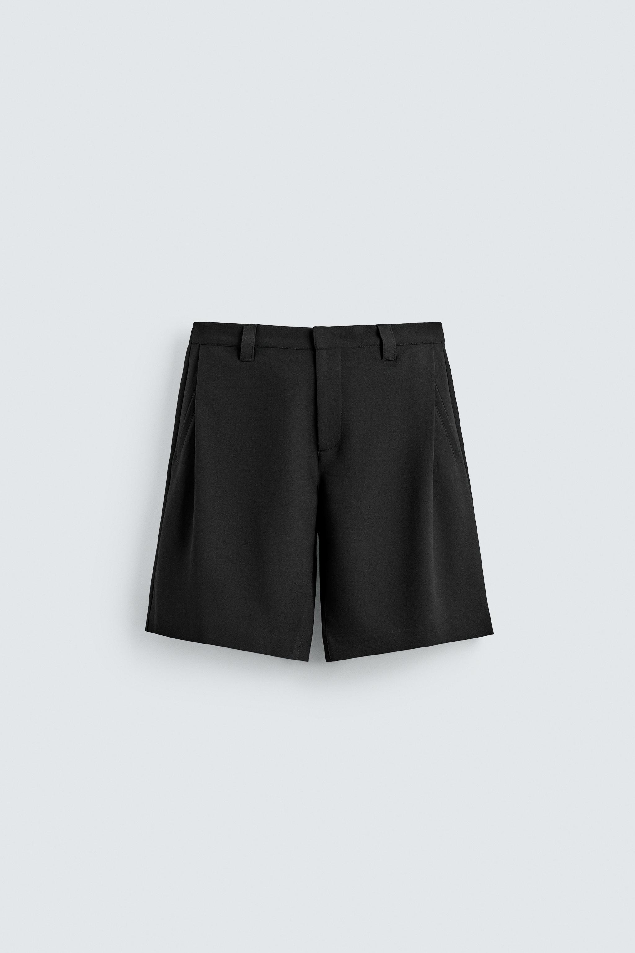 RELAXED FIT SIDE PLEAT SHORTS